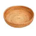Hand-woven rattan storage basket in natural autumn vine, round shape with tapered edges, unpaintedHand-woven rattan storage basket in natural autumn vine, round shape with tapered edges, unpainted