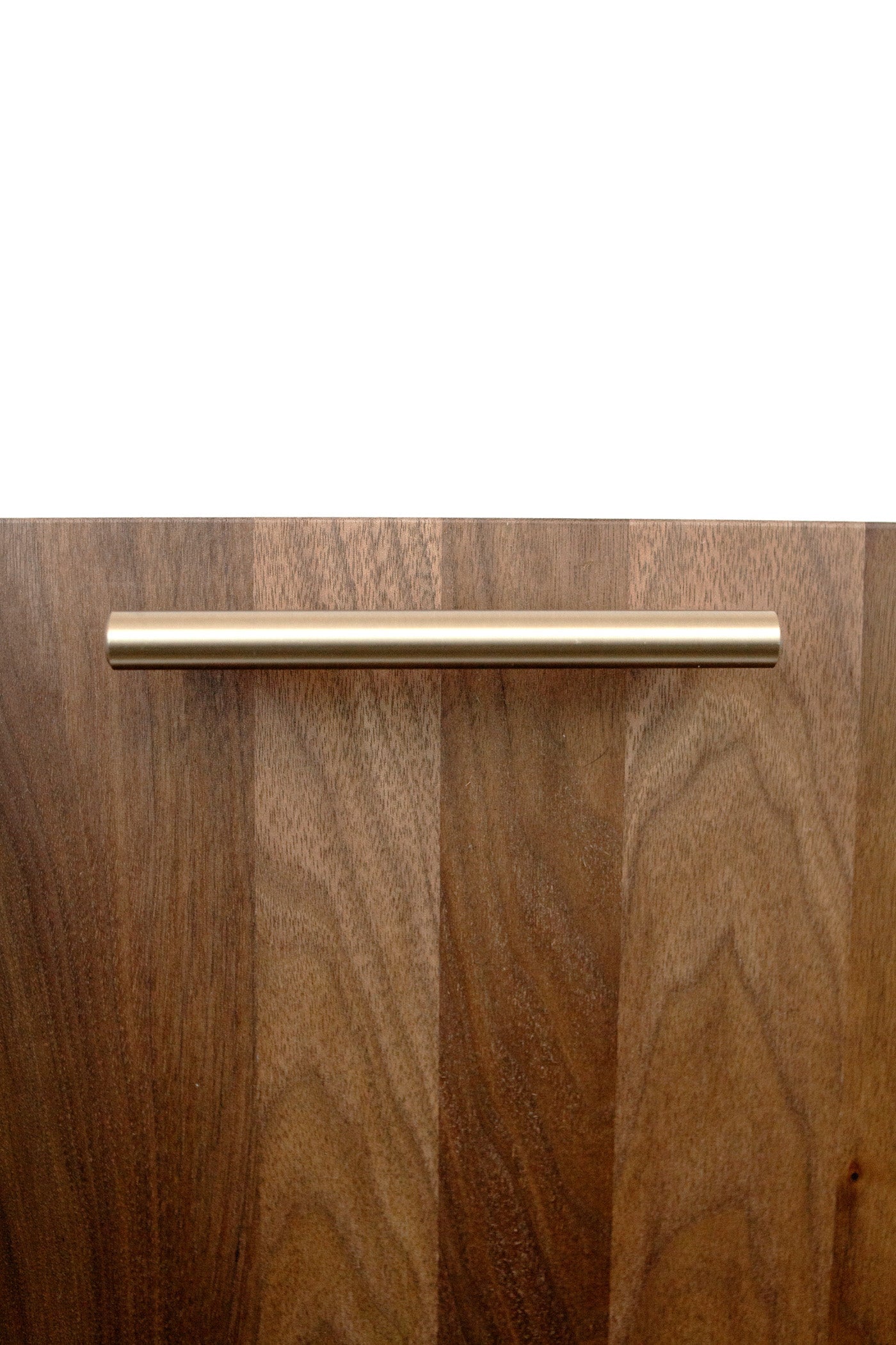 Champagne bronze handle detail on solid walnut charcuterie board