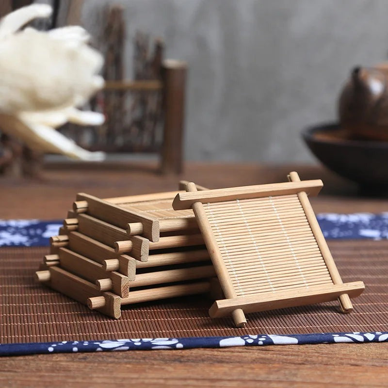 Stack of square bamboo coasters showing the crossed bamboo poles at each corner, Serein Home