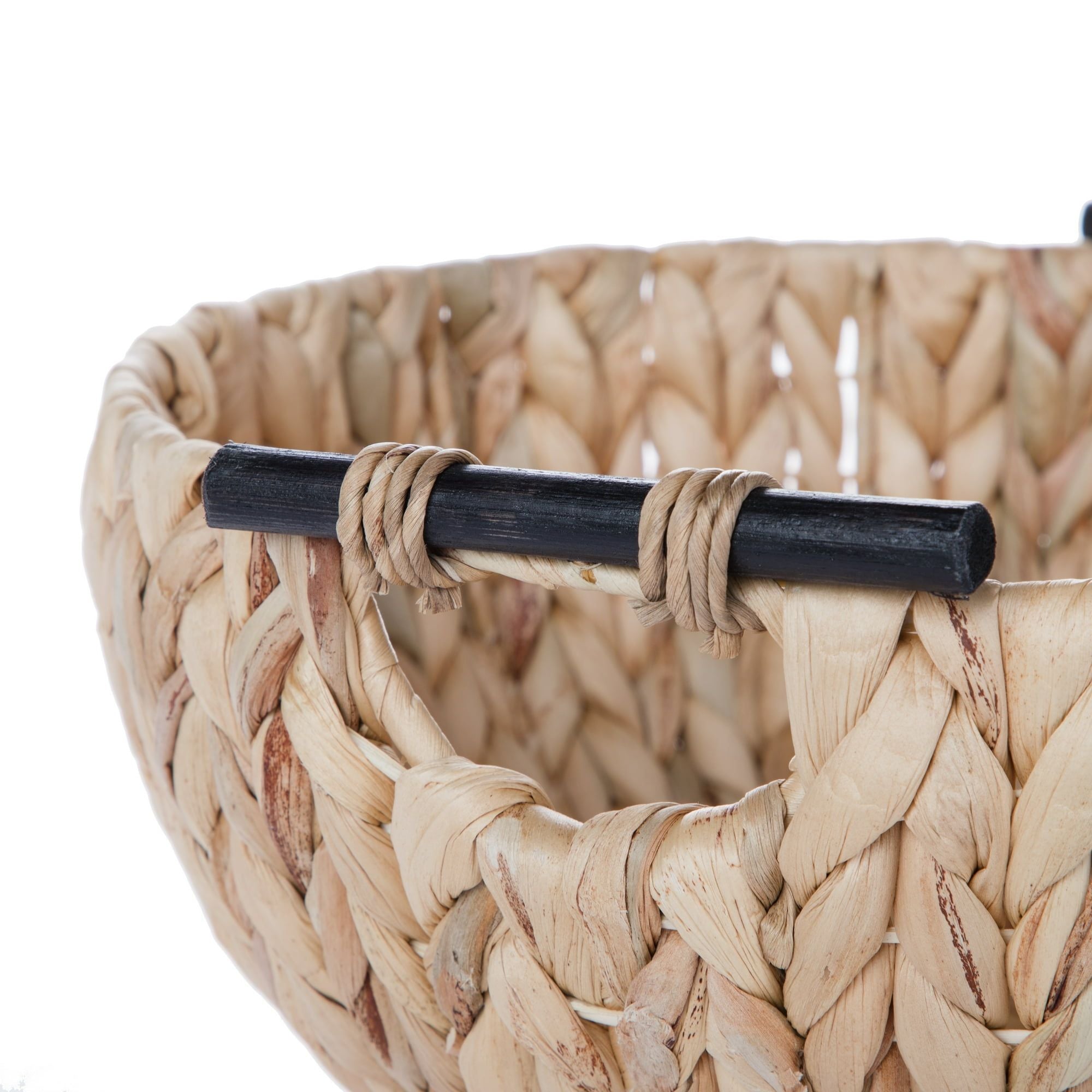Close-up of the handwoven water hyacinth texture and wooden handle join — Serein Home