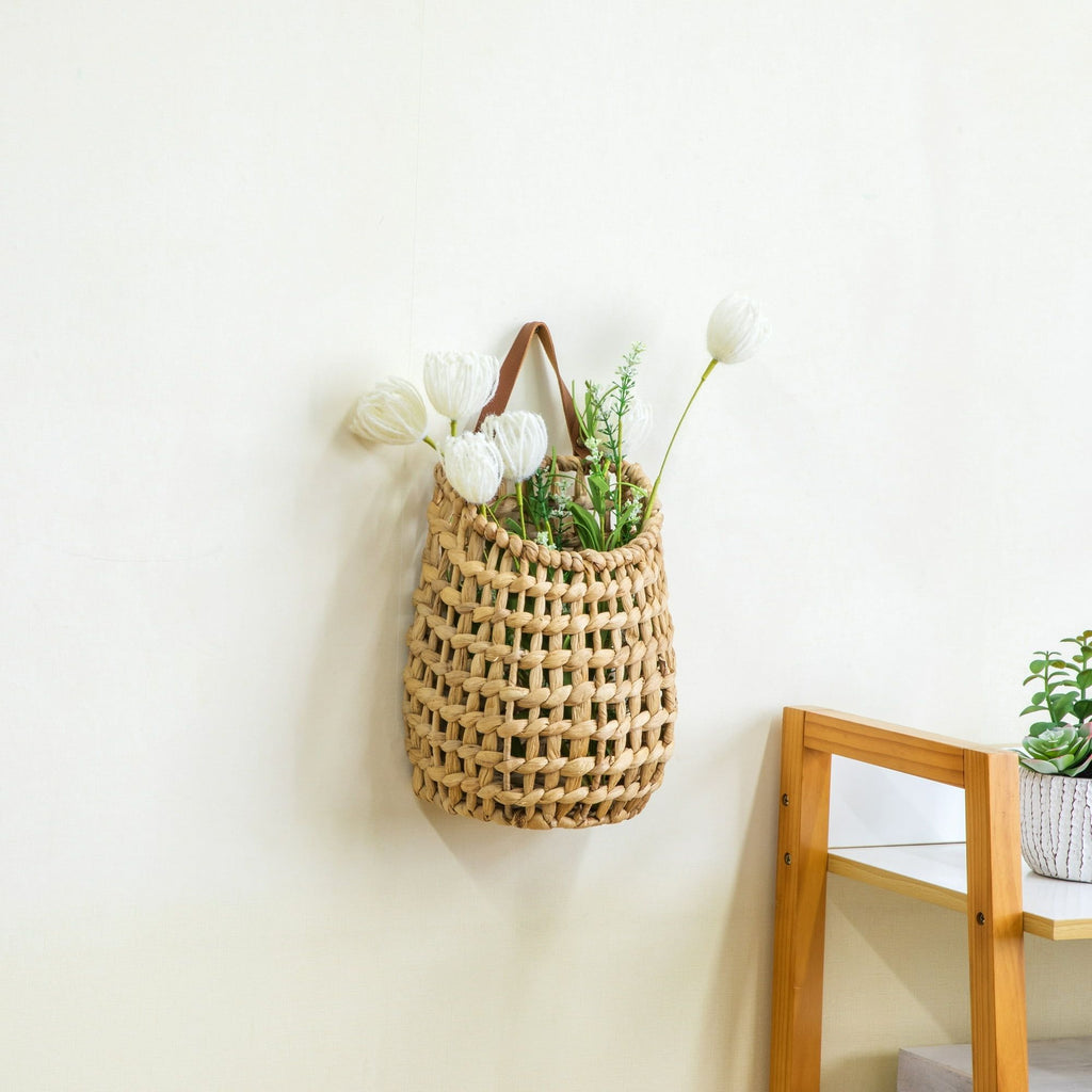 Woven hanging basket with dried stems, shown on a wall — Serein Home