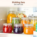 Six clear glass clip-top jars arranged on a pantry counter with natural home decor
