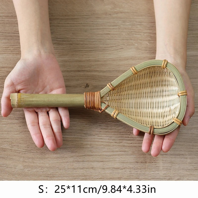 Small 25 cm bamboo strainer held across two open hands to show its size, Serein Home