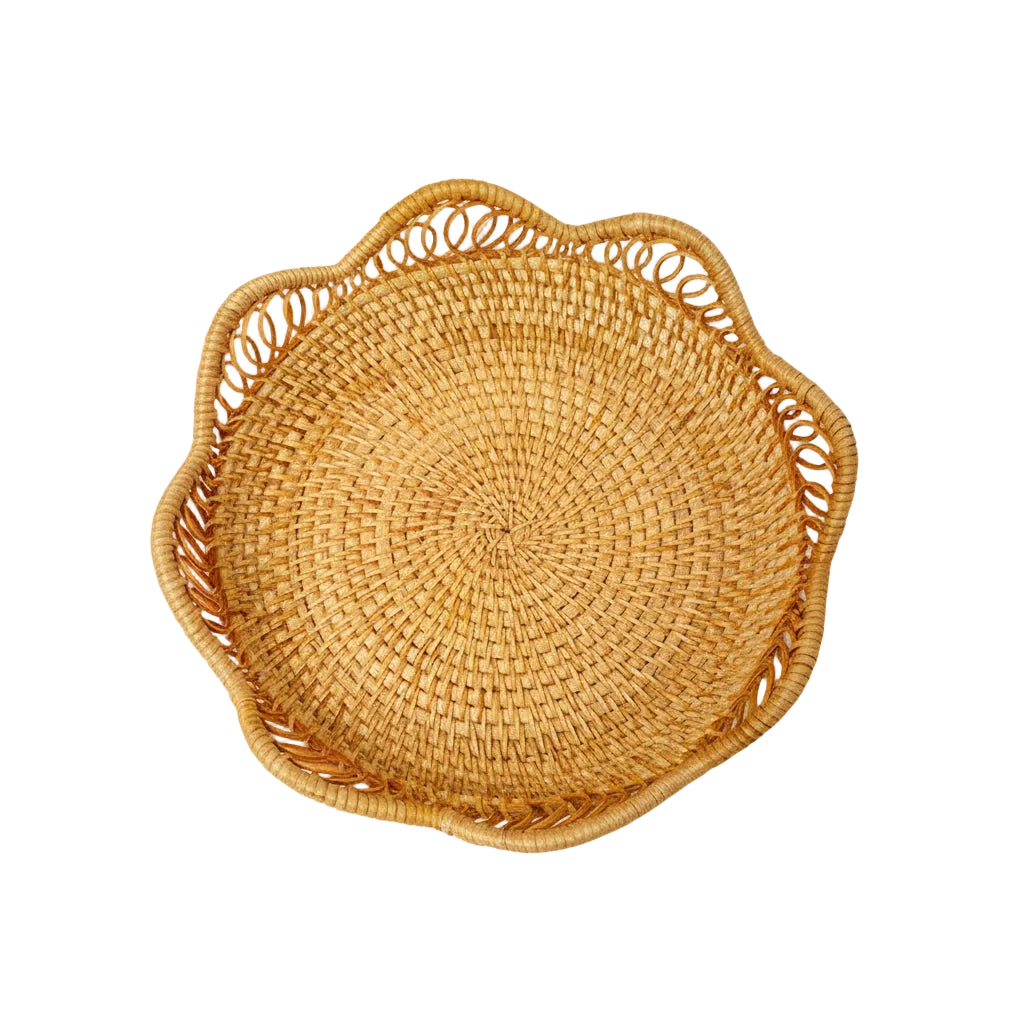 Handwoven natural rattan tray with scalloped wavy edge and integrated side handles
