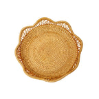 Handwoven natural rattan tray with scalloped wavy edge and integrated side handles