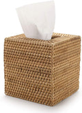 Natural handwoven rattan tissue box cover by Serein Home shown from a front three-quarter angle with a white facial tissue.