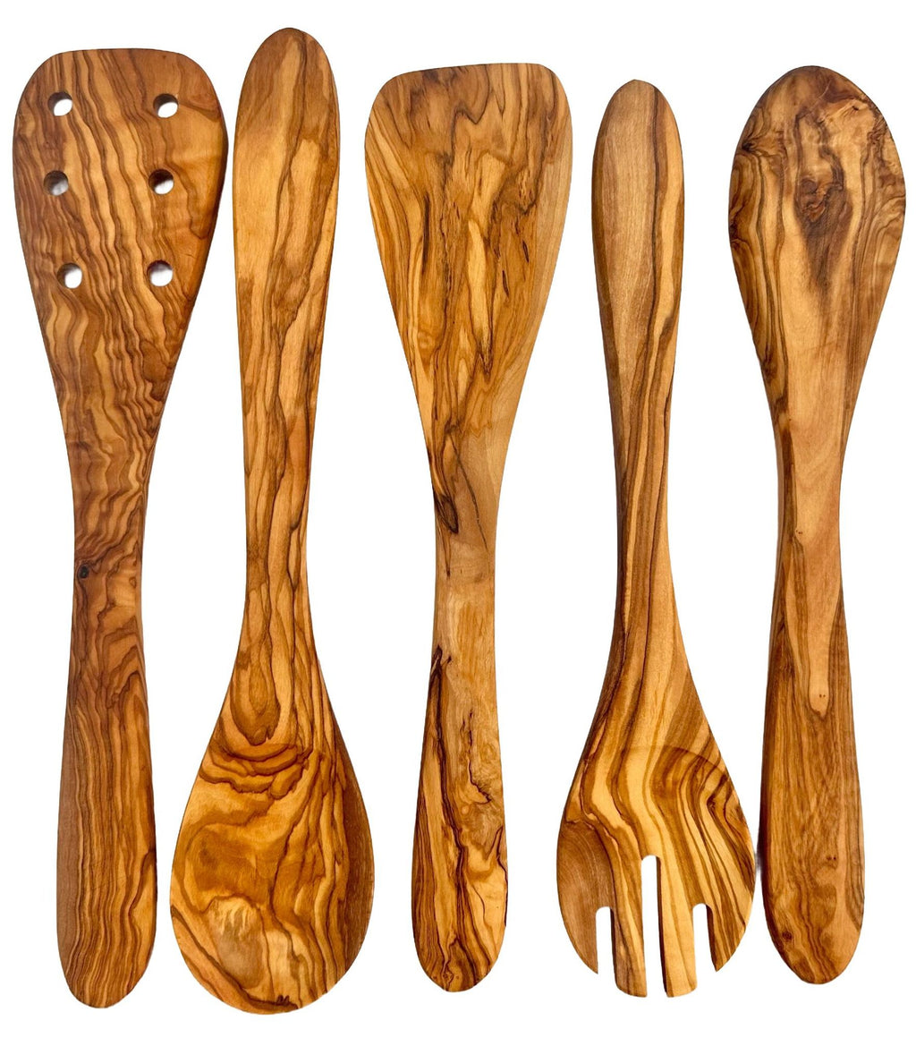 Close-up of five olive wood cooking utensils showing natural grain patterns.