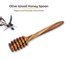 Rustic kitchen scene with olive wood honey dipper and natural decor