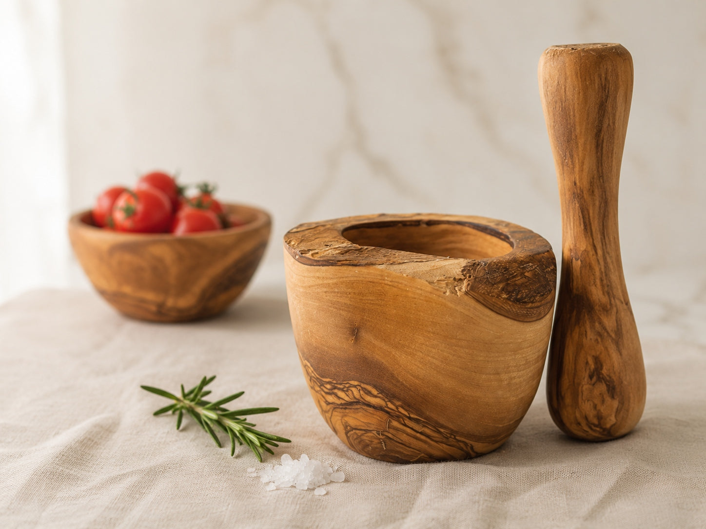 Olive wood mortar and pestle set for herbs, spices, and slow kitchen prep.
