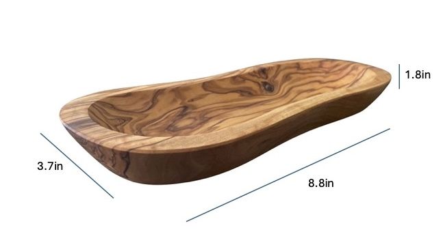 Olive wood wavy serving bowl showing dimensions and size comparison for tabletop use