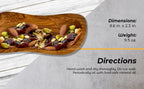 Olive wood bowl used as snack serving dish with size reference in a modern kitchen setting
