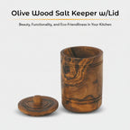 Rustic kitchen countertop with olive wood salt keeper and natural cooking ingredients