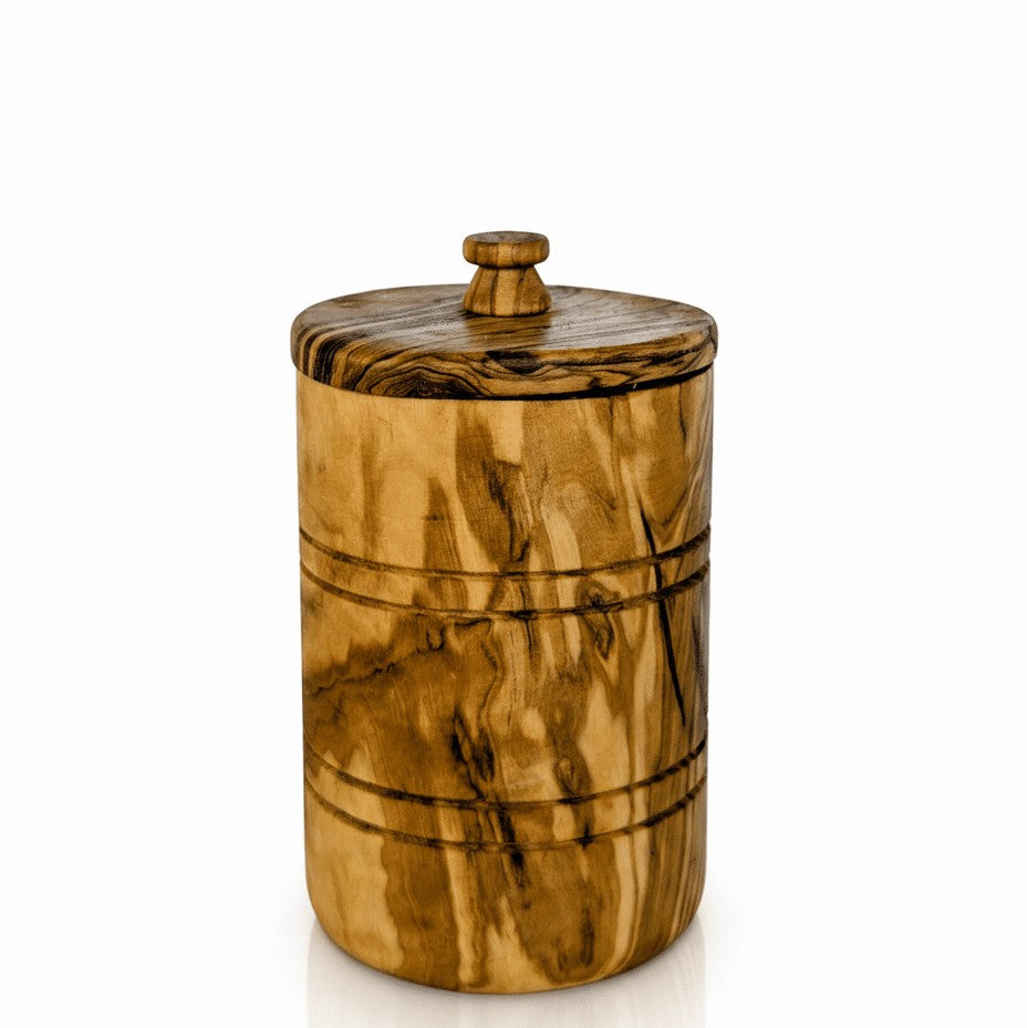 Olive wood salt keeper with fitted lid and natural grain pattern.
