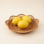 Close-up detail of handwoven rattan scalloped wavy edge and natural weave texture