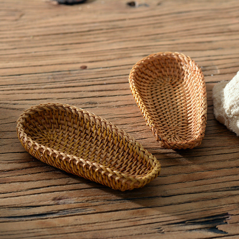 Close-up of wild rattan tray showing artisan hand-weave detail and natural texture variation