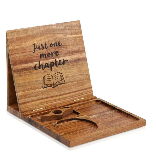 Folding wood book stand open on white, engraved panel and tray with mug well and phone slot
