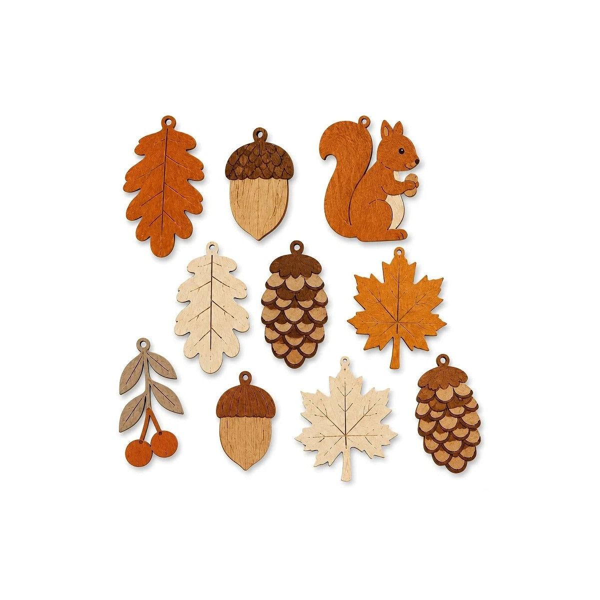 The ten wooden garland pendants laid out: oak and maple leaves, acorns, pinecones and a squirrel