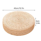 Round straw floor cushion on white, marked 40 cm across and 6 cm high, Serein Home